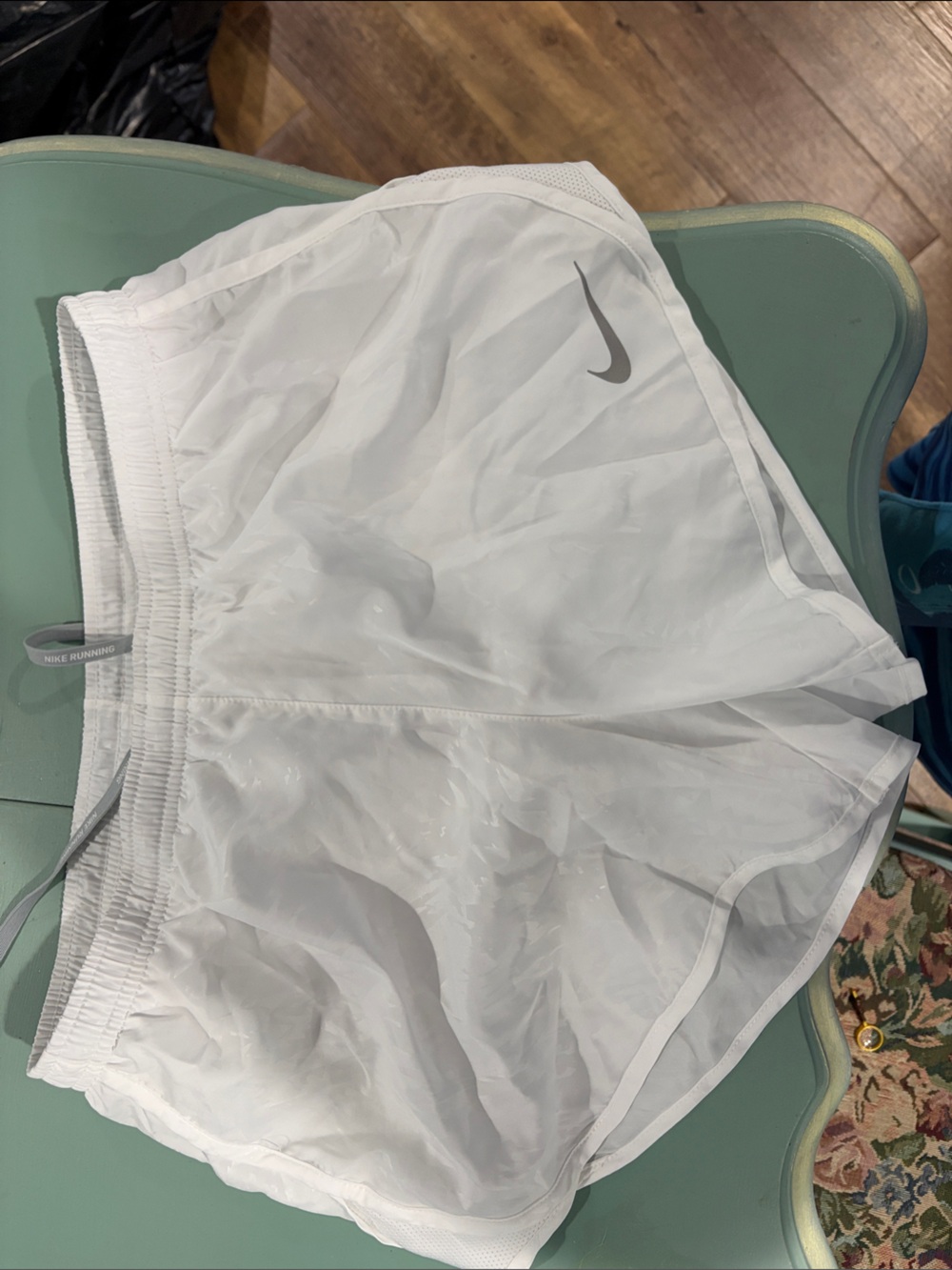 Nike Women’s White Athletic Running Shorts with Silver Swoosh